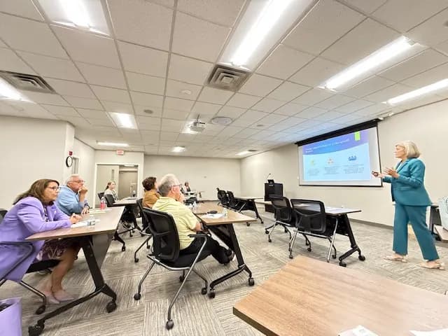 Brenda presenting to board room